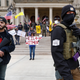 Armed protesters outside the statehouse in Michigan on April 15, 2020.